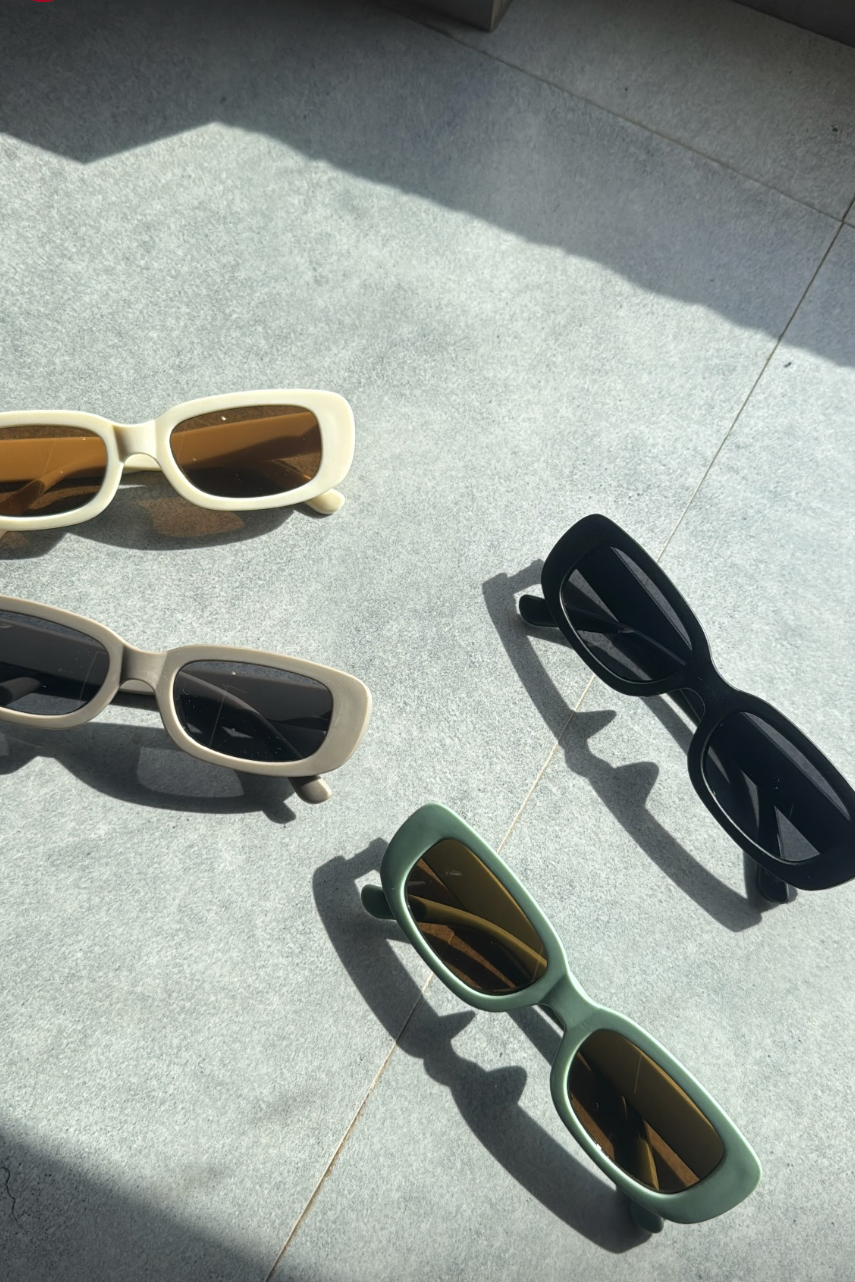 SUN-GLASSES